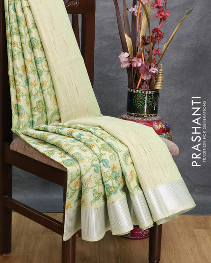 Tissue linen saree pista green with allover prints and silver zari woven border - {{ collection.title }} by Prashanti Sarees