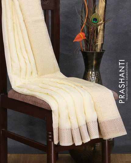 Viscose saree cream with embroided work buttas and zari woven border - {{ collection.title }} by Prashanti Sarees