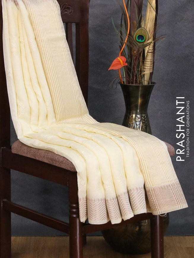 Viscose saree cream with embroided work buttas and zari woven border - {{ collection.title }} by Prashanti Sarees