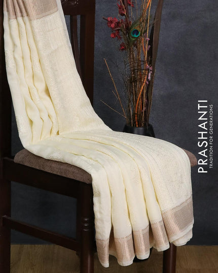Viscose saree off white with paisley embroidery work buttas and zari woven border - {{ collection.title }} by Prashanti Sarees