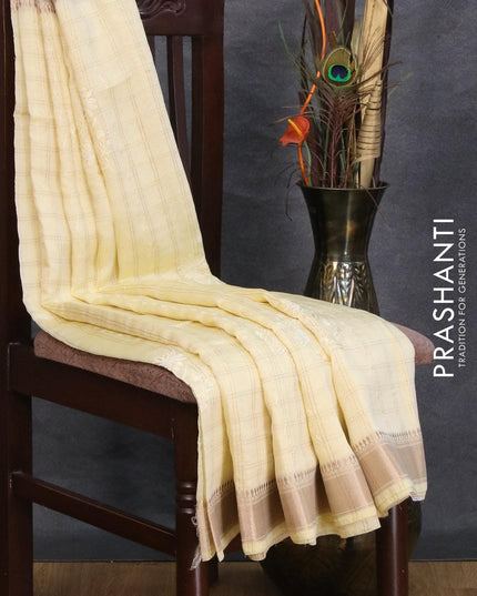 Viscose saree pale yellow with allover zari checks & embroidery work and zari woven border - {{ collection.title }} by Prashanti Sarees